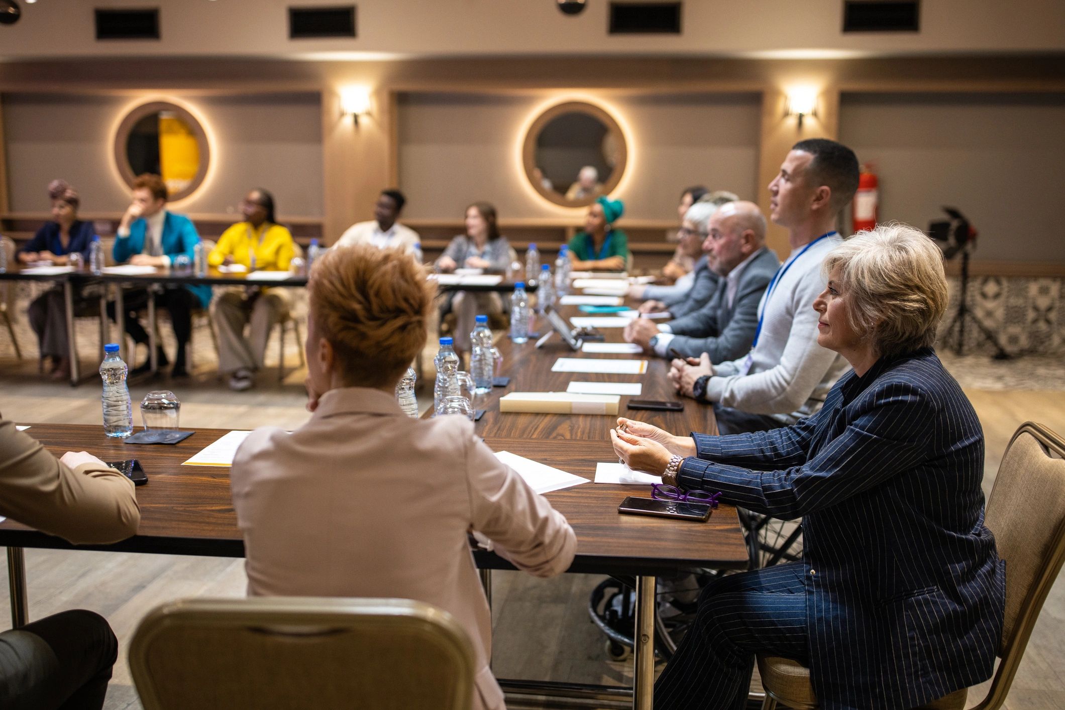 Members listening during a union-style meeting