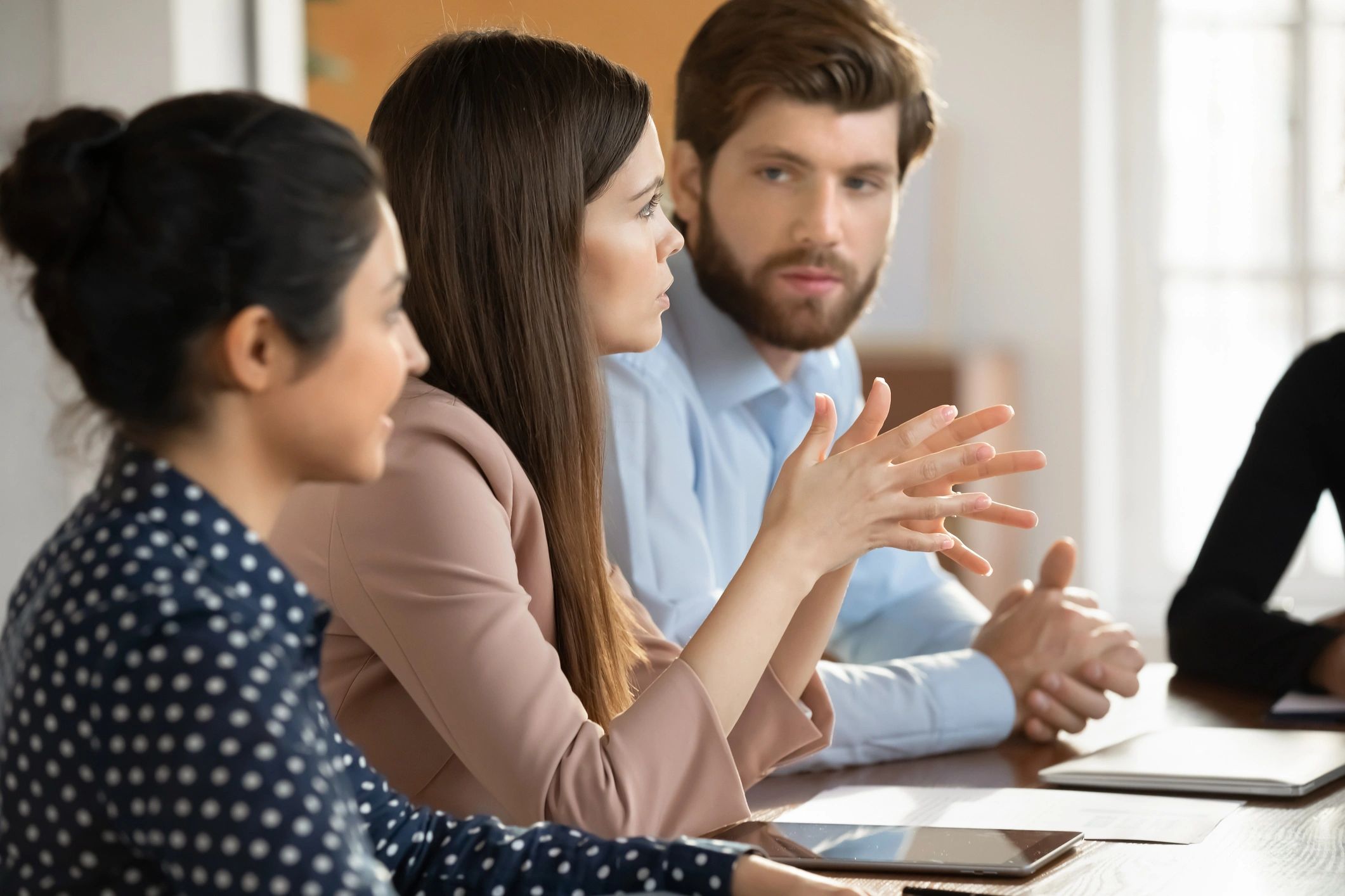 Leadership candidate collaborating with fellow workers